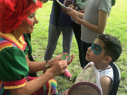 roscoe picnic kid getting face painted